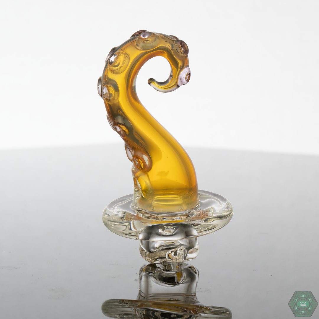 Wicked Glass Tentacle Spinner Cap in Clear, featuring a unique tentacle design for optimal airflow control and smoother vapor.