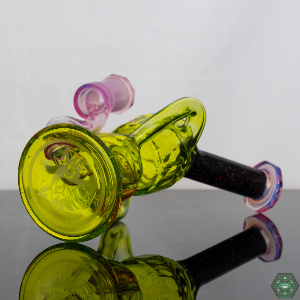 Wolfe Glass Dab Rig: The Double Single Internal Drain Recycler #1 is a testament to Wolfe Glass's commitment to quality and artistry.